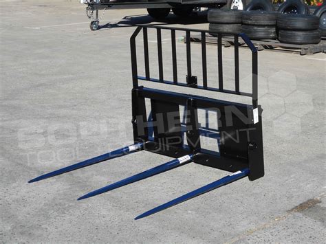 hay fork attachment for skid steer|skid steer hay bale attachment.